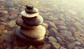zen-balance-rocks-pebbles-covered-water-concept-60045258